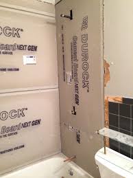 These screens are essential for keeping the bathroom dry and safe while also enhancing the overall beauty. Installation Of Cement Walls Durock Shower Wall Glass Block Shower Bathroom Tub Shower