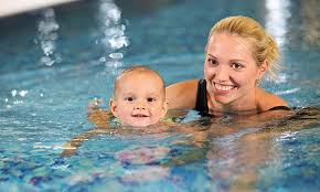The Benefits Of Infant Swim Lessons For Babies Detroit And Ann Arbor Metro Parent Swim Lessons Indoor Swimming Pools Pool