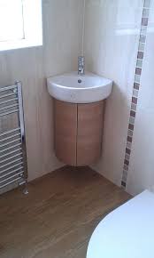 This is a beautiful functional vanity located in the corner and has ample space for storage. 20 Of The Most Stylish Small Bathroom Sinks Housely Corner Sink Bathroom Small Bathroom Sinks Small Space Bathroom