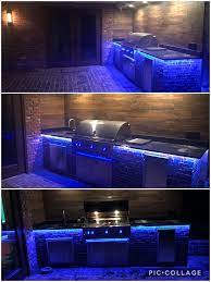 Diy Rustic Outdoor Kitchen With Lynx Grill Brushed Granite Countertop And Led Lighting For Ni Diy Outdoor Kitchen Outdoor Kitchen Outdoor Kitchen Countertops