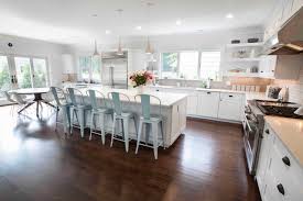 To begin kitchen island installation, first trace an outline of the cabinets on the floor. Modern Classics Mobile