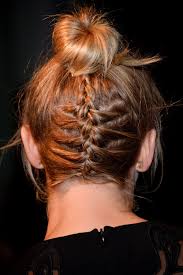 Two french braid hairstyle with a sock bun. French Braid Hairstyles For Every Hair Type This Summer