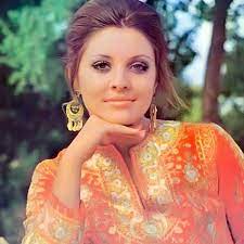 جولولي معرض الصور الملكة جورجينا رزق تستعرض جسدها المثالي في صور شاطئية من السبعينات beauty arabian beauty style