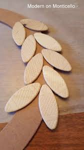 Christmas Wreath Made From Wood Biscuits Found In The Tool Department Wood Biscuits How To Make Wreaths Christmas Wreaths