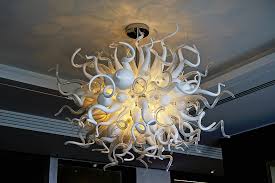 Bespoke contemporary glass chandeliers made to compliment your home. Touching Contemporary Blown Glass Chandeliers Ghirigori Glass And Glass Murano