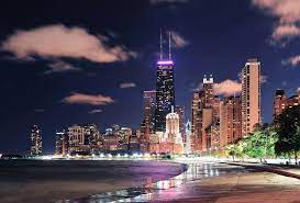 Streeterville Chicago At Night From Oak Street Beach Lake Michigan Chicago City Last Minute Travel Deals