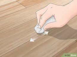 Scuff marks seem to magically appear. 3 Ways To Repair Laminate Floor Scratches Wikihow