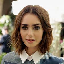 32 Middle Part Wavy Short Hairstyles The Middle Part Help Divide Hair To Both Sides Which Is Lily Collins Short Hair Celebrity Short Hair Thick Hair Styles