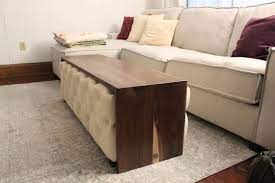 Contemporary ottoman that can be used as a coffee table. The Best Hack For Your Living Room Coffee Table Apartment Therapy