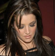 Michael, Mihály "Michu" Meszaros, and Lisa Marie.