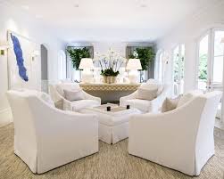 Living Room Conversation Area With Four Chairs And Ottoman Long Living Room Long Living Room Design Room Design