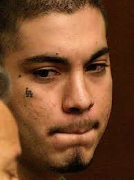 Suspects arraigned in man's slaying