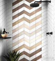 The chevron tile pattern is classic yet contemporary. Shower Tiles Inspiration Chevron Hexawood Shower Wall Tile Tile Inspiration Chevron