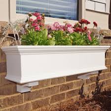 Here is a flower box that is attached to a shingled overhanging roof. 36 White Window Box Flower Window Boxes