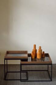 A glass coffee table makes for an elegant, subtle addition to the room, while a coffee table with storage is perfect for creating space for a striking centerpiece. Square Tray Coffee Table Set