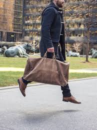 Huge collection of camel toe!!! Person In Black Pants And Brown Leather Sling Bag Walking On Sidewalk During Daytime Photo Free Bull Image On Unsplash