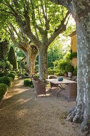 Decomposed Granite Court Yard Boxwood Manicured Hedges Shade Trees Perfection Patio Ideas Gravel In 2020 Patio Garden Pea Gravel Patio French Garden