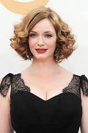 This hair style will offset the full curly length on the top while giving you a very hip style. Ride The Wave The Best Retro Curls At The Emmys Vintage Hairstyles Retro Hairstyles Curly Hair Styles