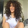 Long layers haircut curly hair. 1