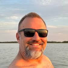 Benefits or drawbacks of over the transom headers vs through transom  exhaust logs?