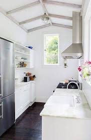 It's essential to create a kitchen that matches the homeowner's preferences. 6 Small Galley Kitchen Ideas That Are Straight Up Great Small Galley Kitchens Galley Kitchen Design Interior Design Kitchen
