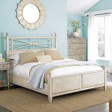 Complete the natural look of this spacious bedroom with a sisal rug, fresh plants, and crisp furnishings. Bedroom Beach Themed Bedroom Designs And New Ideas Nautical Beach Theme Bedroom Furniture Set Beach Bedroom Beach Themed Bedroom Beachy Bedroom