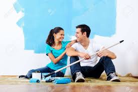 See more ideas about canvas painting, couples canvas painting, painting. Couple Painting New Home Together With Blue Color Happy And Carefree Stock Photo Picture And Royalty Free Image Image 20571320