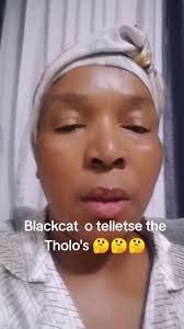 Lydia Tholo Black Cat