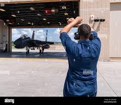 A crew chief communicates with a pilot while launching aircraft from Moron  Air Base, Spain in support of Operation ENDURING FREEDOM. Subject  Operation/Series: ENDURING FREEDOM Base: Moron Air Base State: Sevilla  Country: