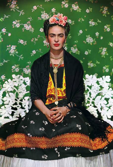 Frida Kahlo in traditional Mexican Tehuana attire, AI generated