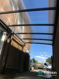 14 feet tall leg height with approx 17 feet center clearance. Wall Attached Carport Tonbridge Kent Kappion Carports Canopies