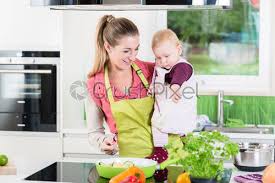 Sign up for free today. Mother Working In Kitchen While Carrying Child Stock Photo Crushpixel