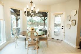 Musehomeinc modern design 3 pieces solid wood breakfast nook corner table set with side bench, hidden storage nook table set for small space, corner kitchen table, dining set in white color. Traditional White Breakfast Nook With Round Table And Chandelier Hgtv