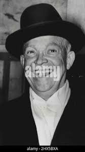 U.S. President-elect Dwight D. Eisenhower, left, has lunch with his old  outfit, the 15th regiment of the Third Division, in South Korea in Dec.  1952. At center is Sgt. Jack P. Hutcherson,