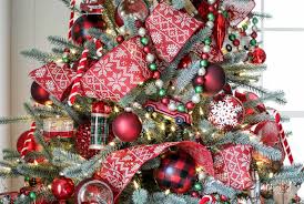 Evergreen trees are decorated with stars. Cozy Lodge Christmas Tree Christmas Tree Decorating Ideas
