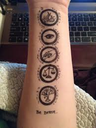 Our talented tattoo artists are passionate about art and believe getting a tattoo is not just a fad, for us it is personal. Just Finished Allegiant And Decided To Freehand This As A Temporary Tattoo Thought I D Share Divergent