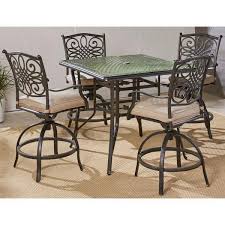 This table weighs 70 pounds and chairs weight over 20 pounds each. Hanover Traditions 5 Piece Aluminum Outdoor High Dining Set With Tan Cushions 4 Sling Swivel Chairs And Square Cast Top Table Traddn5pcsqbr The Home Depot