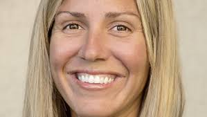 Erin Caputo of ROEM Corporation is a 2016 Woman of Influence