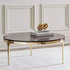 Simple in silhouette yet has a sturdy construction, this coffee table features a spacious top and will add an elegant feel to your home. Elegant Coffee Table Idecorate