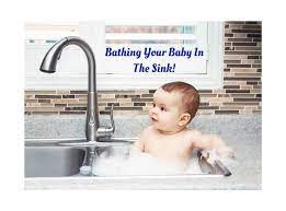 I'd give baby a beaker and a spoon to distract, cheaper than bath toys and as much fun!! Can You Bathe A Baby In A Sink Kitchen Bathroom Laundry How To Natural Baby Life