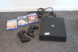 Tv Spel Playstation 4 Pro Med Tva Handkontroller Och Tre Spel Natauktioner Konkursauktioner Fynda Online Ps Auction