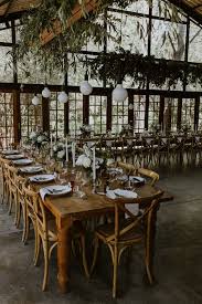 This Minimalist Rustic Montpellier Wine Estate Wedding Included The Sweetest Foot Washing Ceremony Junebug Weddings Rustic Wedding Venues Rustic Wedding Wedding Floral Centerpieces