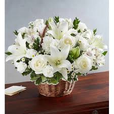 Light pink alstroemeria lily flower are also known as tiger lilies. Hand Tied Arrangement In Basket With Lilies And Roses Cecilia Fdd