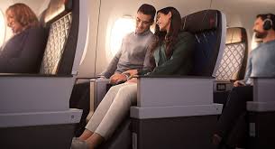 There is no difference in width. Delta Boeing 777 200lr Premium Select Premium Economy Lax Sydney Executive Traveller