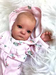 I am a reborn doll artist of 3 years! And a silicone artist for 2 months  Hope this counts as art! Not real!!