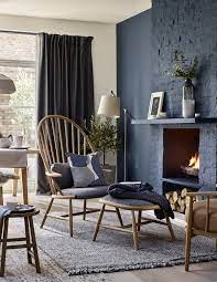 16 Dark Interior Design Ideas To Embrace This Winter Feature Wall Living Room Living Room Scandinavian Curtains Living Room