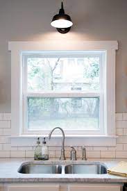 Woven wood shades may be susceptible to food stains and grease spots. Fixer Upper Tackling The Beast Interior Window Trim Kitchen Sink Window Farmhouse Interior
