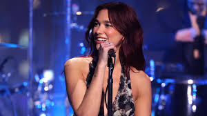 Glastonbury 2024 adds acts to line-up and reveals stage times - BBC News