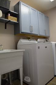Budget laundry room makeover with white shiplap and diy stained wood shelves. Clever Diy Laundry Room Cabinets Shelving That I Should Have Done Yesterday The Diy Nuts