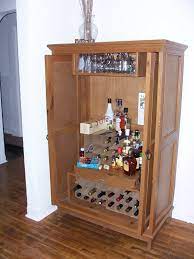 Maybe you would like to learn more about one of these? Armoire Turned Into Bar Storage Yeah This Is A Necessity In My House Locking Liquor Cabinet Corner Liquor Cabinet Armoire Bar